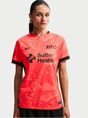 Nike Women's Coral-Pink Soccer Jersey with Black Accents